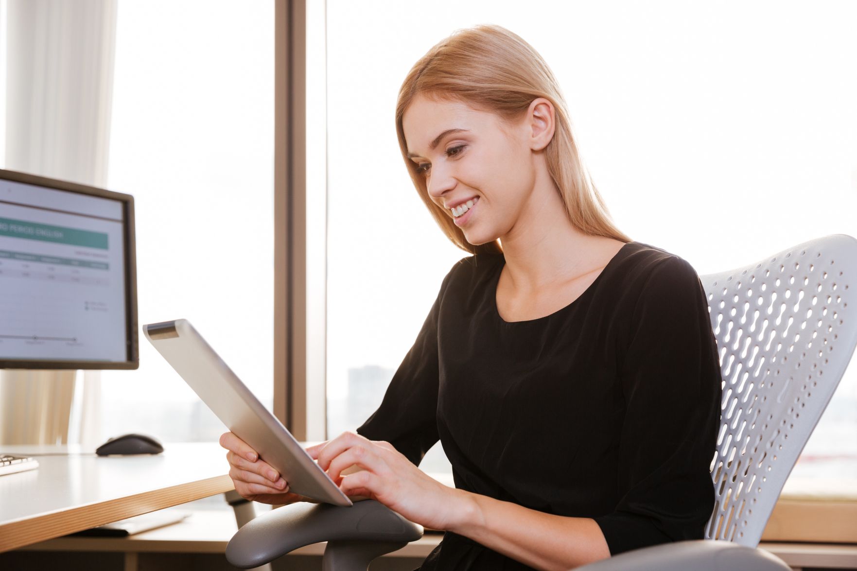 Woman worker using tablet computer